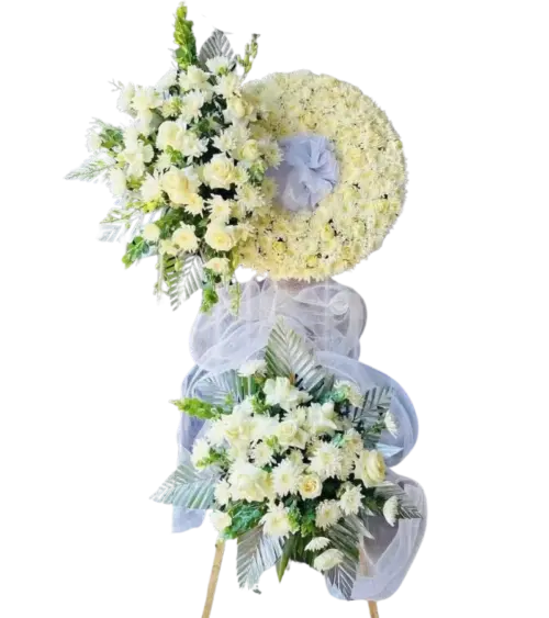 Kệ hoa chia buồn cúc kem và hồng trắng kết hình xoắn
