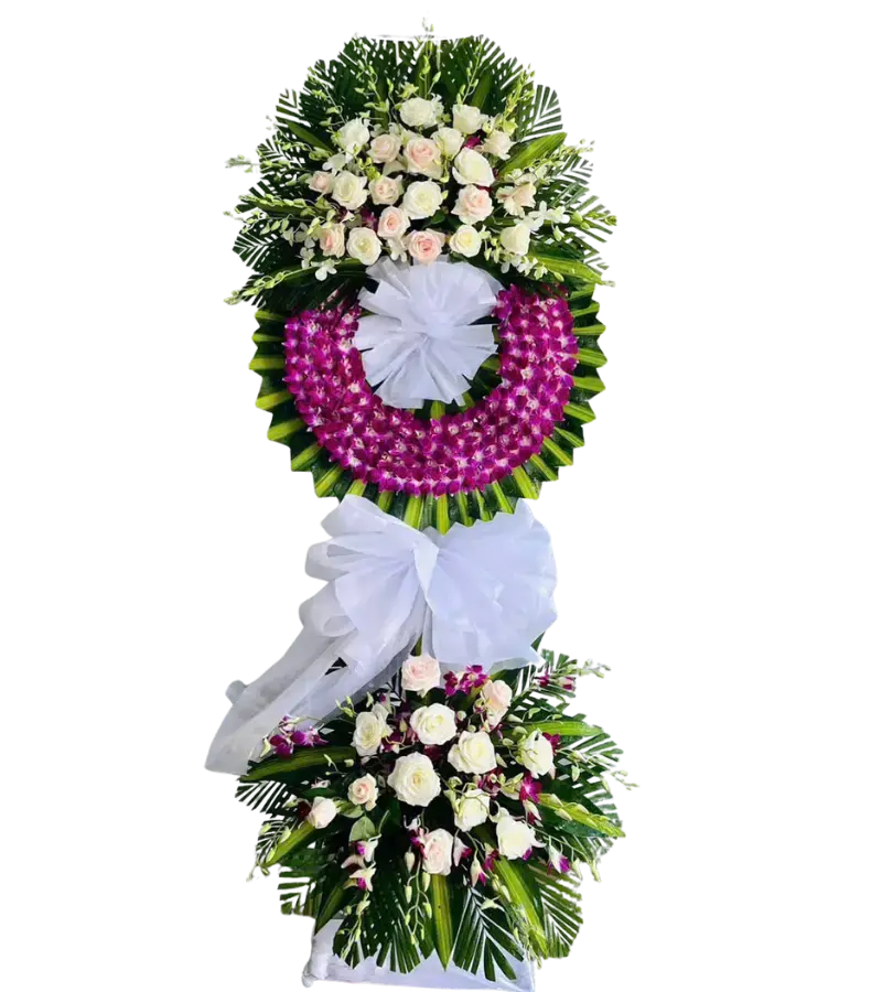 Kệ hoa chia buồn hồng kem và lan tím