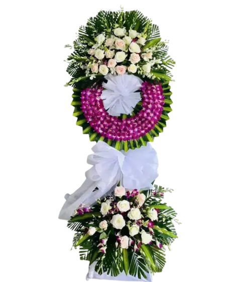 Kệ hoa chia buồn hồng kem và lan tím