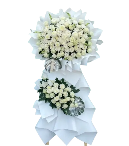 Kệ hoa chia buồn hồng trắng và cúc trắng gói giấy trắng