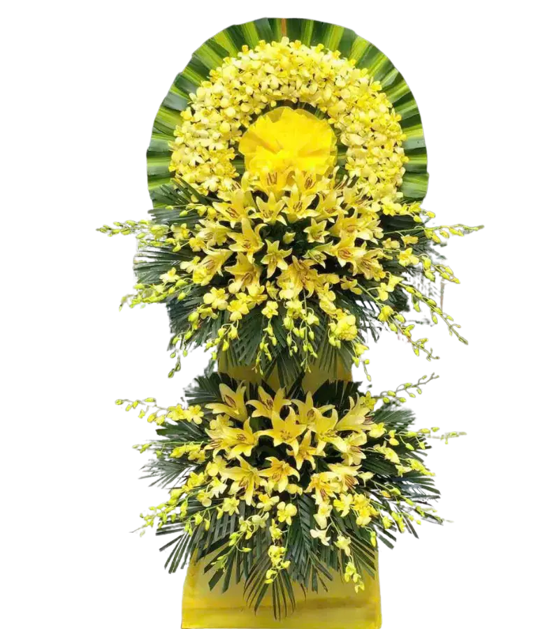 Kệ hoa chia buồn lan vàng và ly vàng