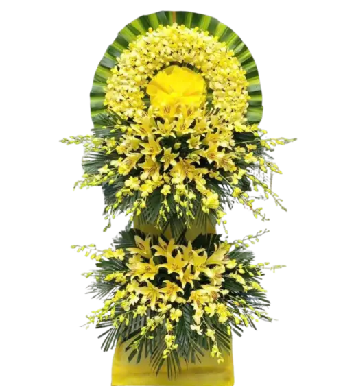 Kệ hoa chia buồn lan vàng và ly vàng
