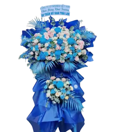 Kệ hoa khai trương xanh dương phối hồng phấn kèm bảng chữ